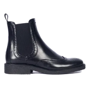 Boot with decorative brogue pattern