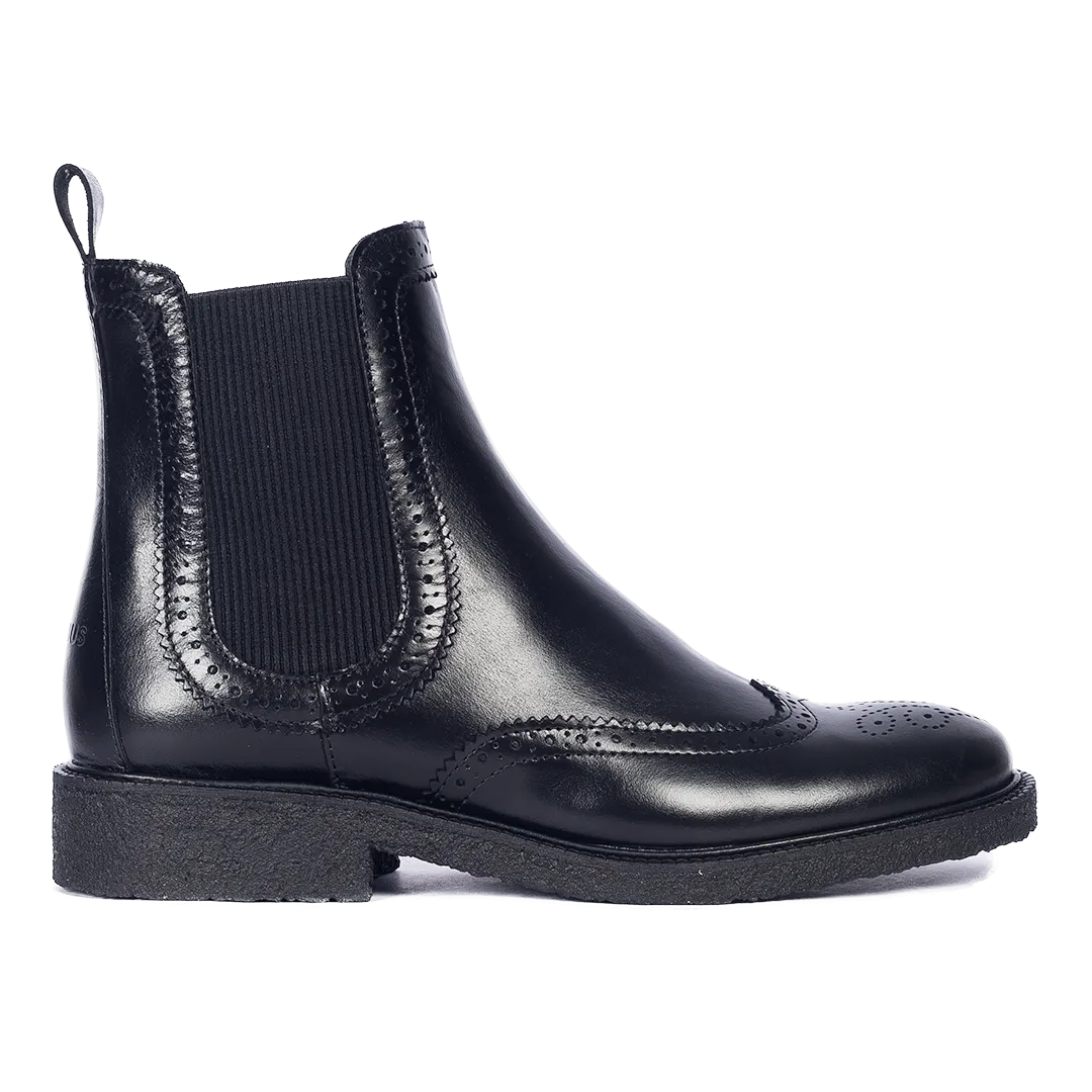 Boot with decorative brogue pattern